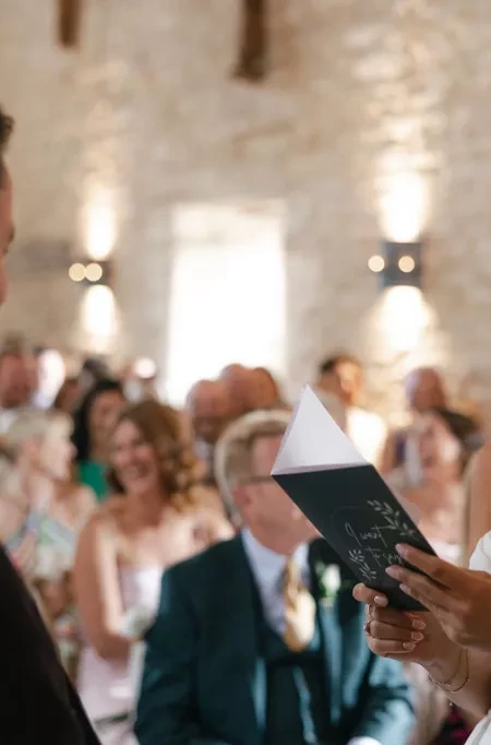 lose-up of a wedding couple exchanging personalised vow during a modern celebrant-led ceremony.