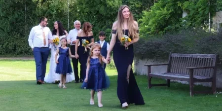 Family walking on grass